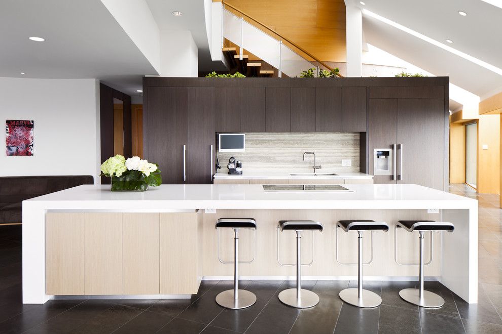 Standard Bar Stool Height for a Contemporary Kitchen with a Dark Floor and North Van Renvovation by Natural Balance Home Builders