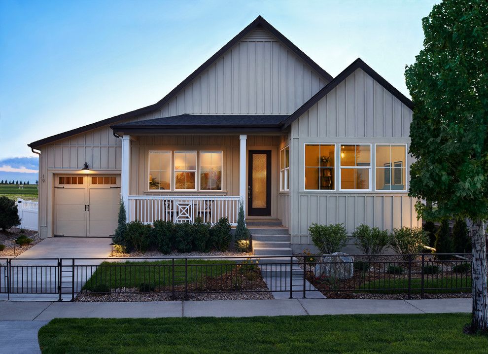 Stay Tuff Fence for a Farmhouse Exterior with a Board and Batten and Brighton Crossing by Brookfield Residential Colorado