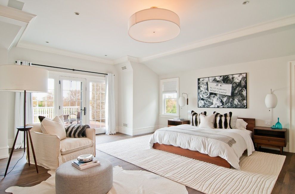 Steam Room vs Sauna for a Transitional Bedroom with a Wood Nightstand and Hampton House by M.s. Architecture