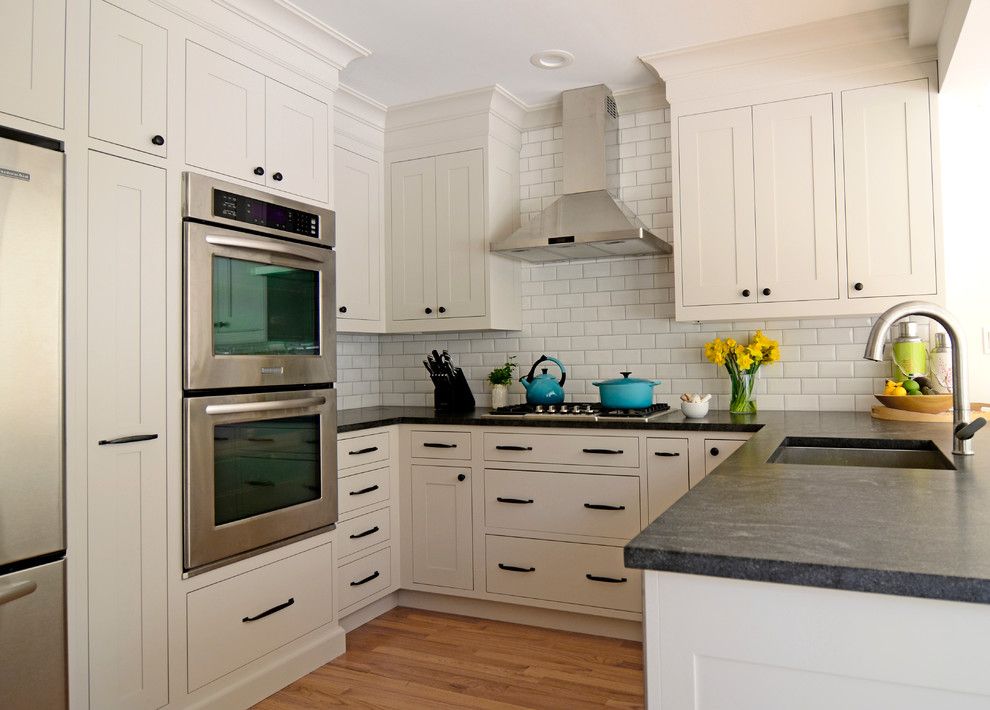 Stiles Construction for a Traditional Kitchen with a Grey Cabinets and Rockwood Colonial Larchmont by Studio Dearborn