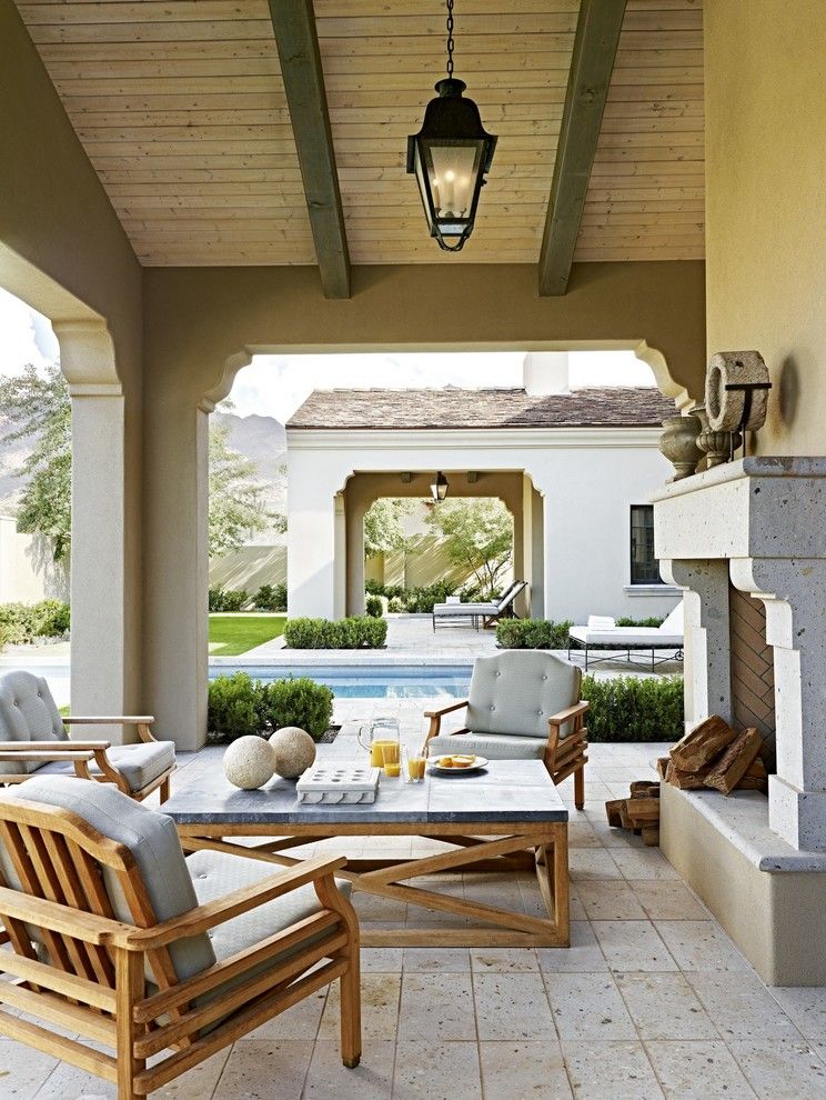 Sto Stucco for a Traditional Patio with a Stone Fireplace Mantel and Eclectic Desert Pied 'A Terre by David Michael Miller Associates