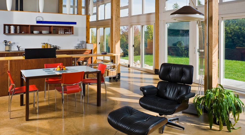 Straw Bale Construction for a Contemporary Dining Room with a Window Wall and Straw Bale House by Electric Bowery