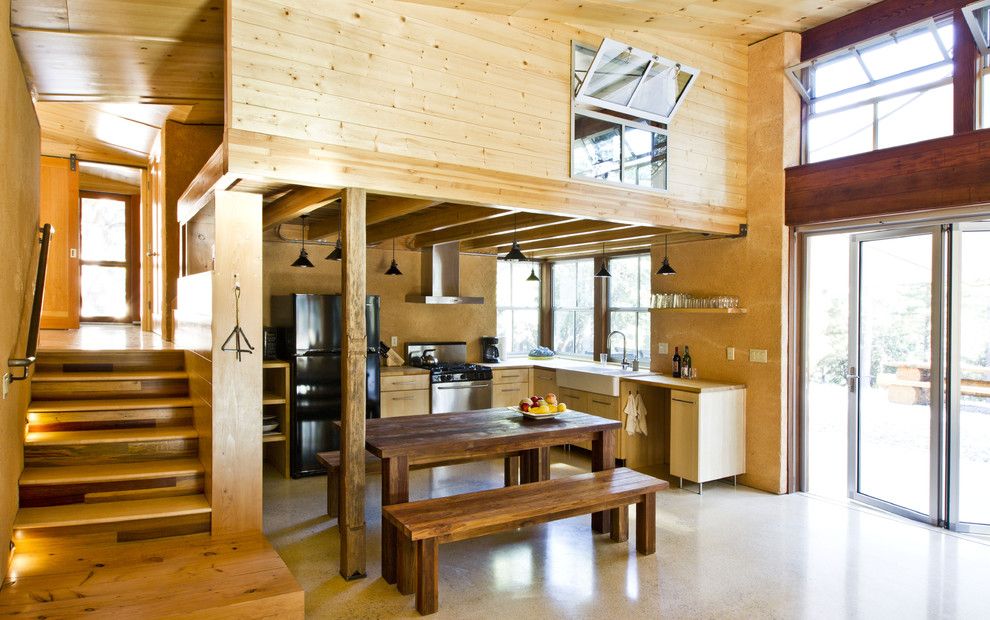 Straw Bale Construction for a Rustic Kitchen with a Arkin Tilt Architects and Chalk Hill Off Grid Cabin Kitchen by Arkin Tilt Architects