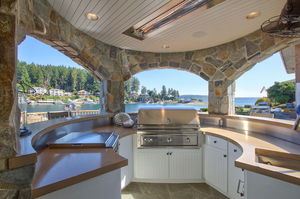 Summers Heating and Cooling for a Beach Style Patio with a Heat Lamp in Ceiling and Coastal Cove House by Gelotte Hommas Architecture