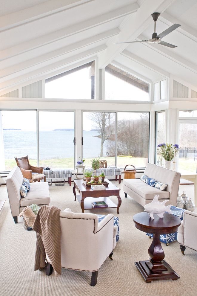 Sun Realty Outer Banks for a Traditional Family Room with a Sofa and Coastal Maine Home by Celia Bedilia