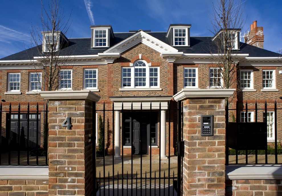 Suncoast Property Management for a Transitional Exterior with a Gate Control and Roehampton Development by Inspired Dwellings