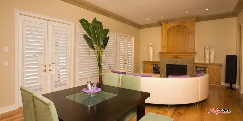 Sunland Shutters for a Midcentury Living Room with a Midcentury and Sunland Shutters  Polycore by Ej's Home Improvements, Inc.