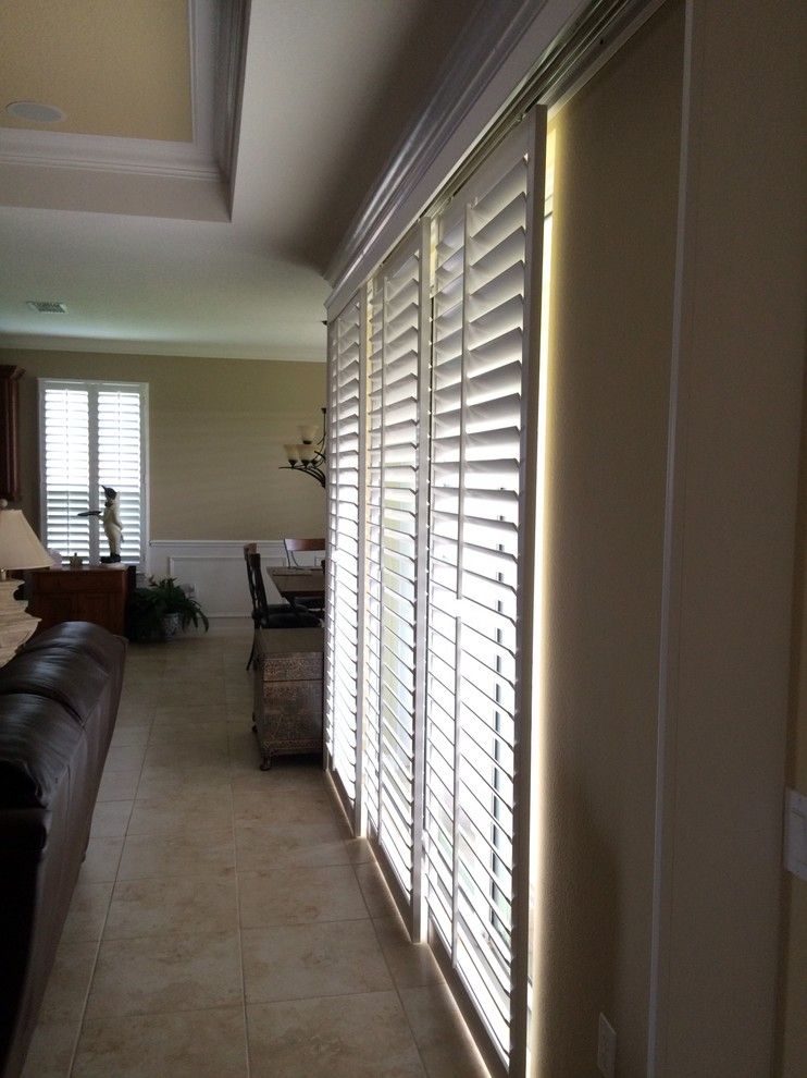 Sunland Shutters for a Transitional Family Room with a 3 12 Louvers and by Pass Shutters by Dbs by Ginger Llc