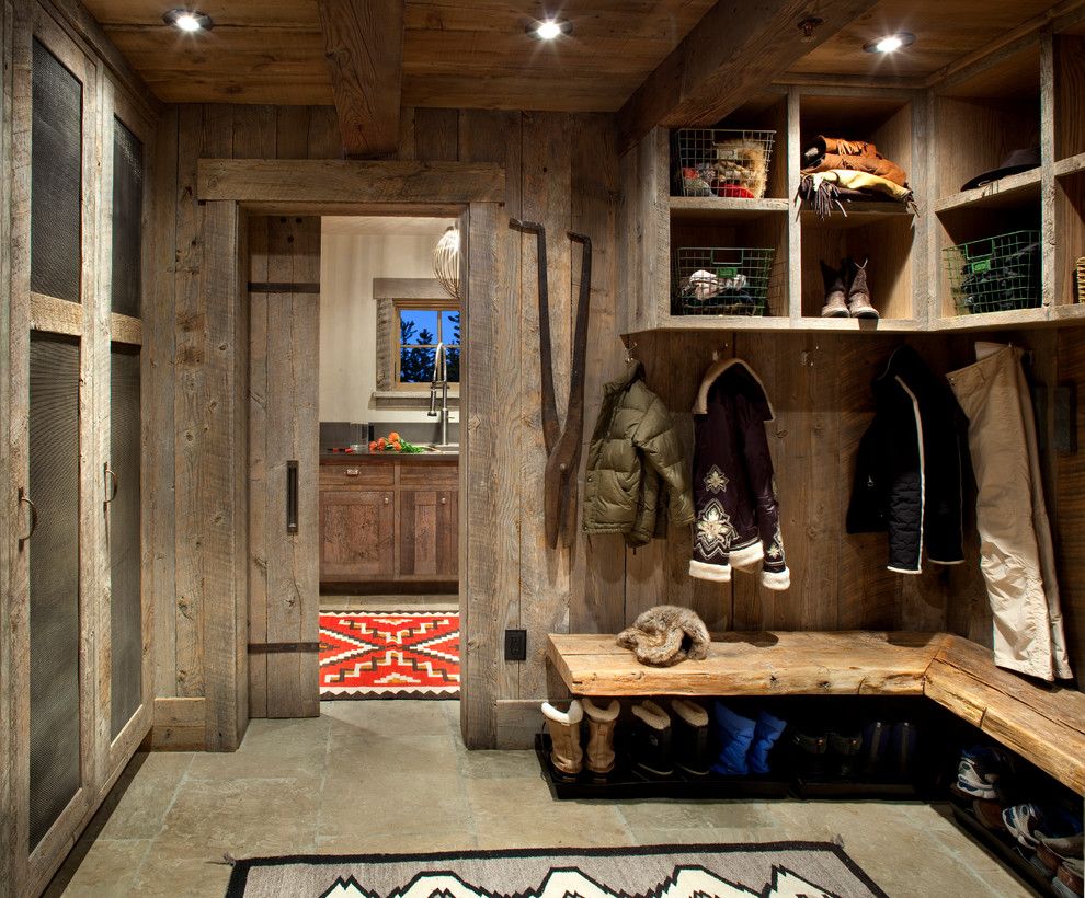 Sunnyvale Rod and Gun for a Rustic Entry with a Wood Ceiling and Mudroom/laundry Room by Peace Design