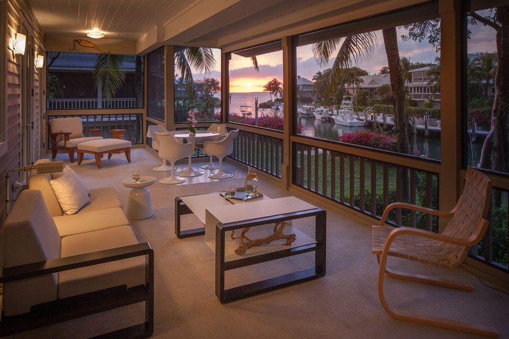 Sunset at the Palms Negril for a Contemporary Porch with a Modern Coffee Table and Key Largo by Michael Wolk Design Associates