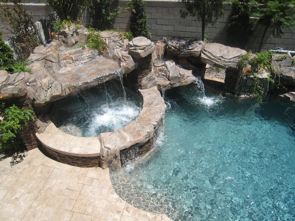 Sylvan Pools for a Rustic Pool with a Cantilevered and Freeform Pool & Spa   Silverado Springs   Las Vegas, Nv by Anthony & Sylvan Pools