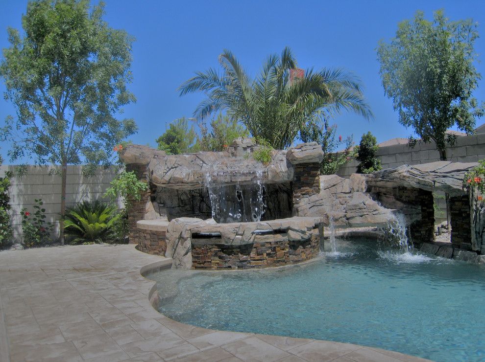 Sylvan Pools for a Rustic Pool with a Cantilevered and Freeform Pool & Spa   Silverado Springs   Las Vegas, Nv by Anthony & Sylvan Pools