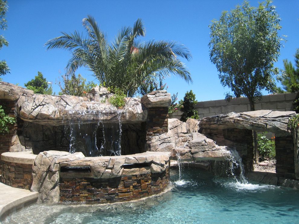 Sylvan Pools for a Rustic Pool with a Swimming Pool and Freeform Pool & Spa   Silverado Springs   Las Vegas, Nv by Anthony & Sylvan Pools