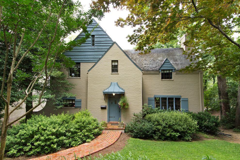 Tardis Blue Paint for a Traditional Exterior with a Grass and Expanded Tudor by Bennett Frank Mccarthy Architects, Inc.