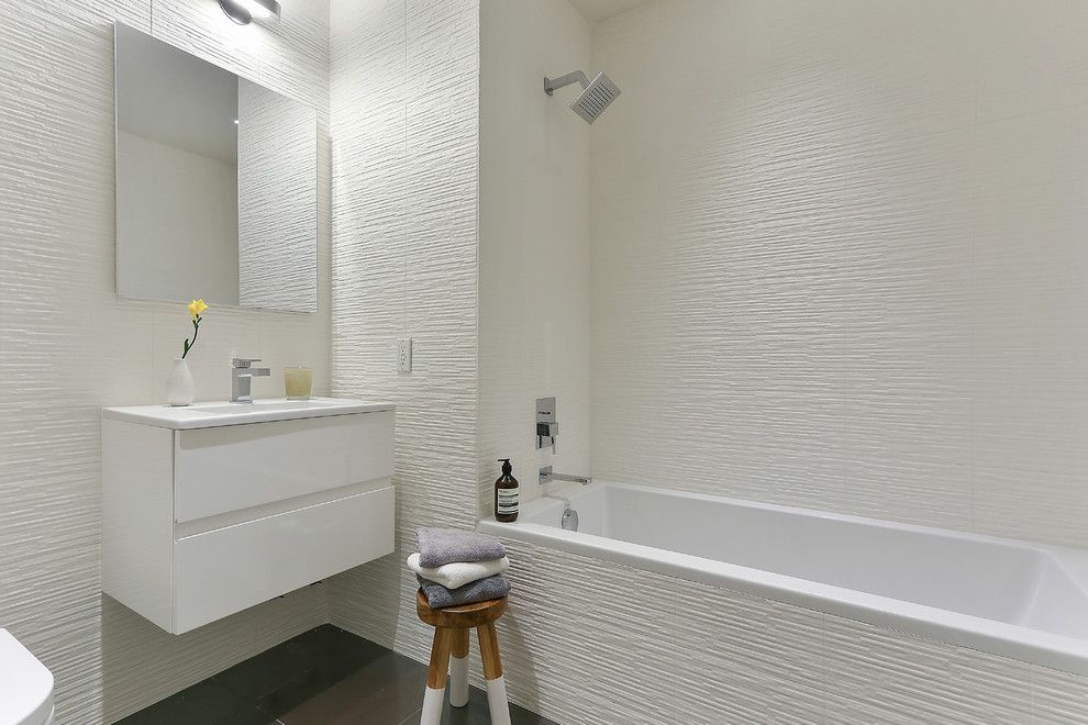 Texturing Walls for a Contemporary Bathroom with a Wall Mirror and E.7th St. Condo, Manhattan Ny by Eisner Design Llc