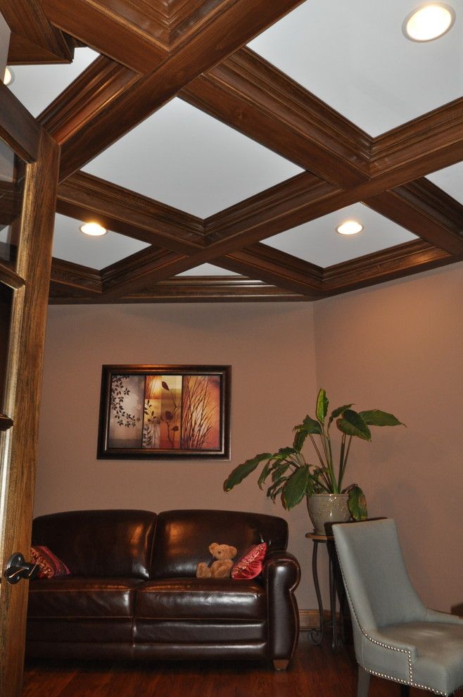 The Ashleys for a Transitional Home Office with a Wood Box Beam Ceiling and Wooded View by Ashley Construction / Ashley Remodeling