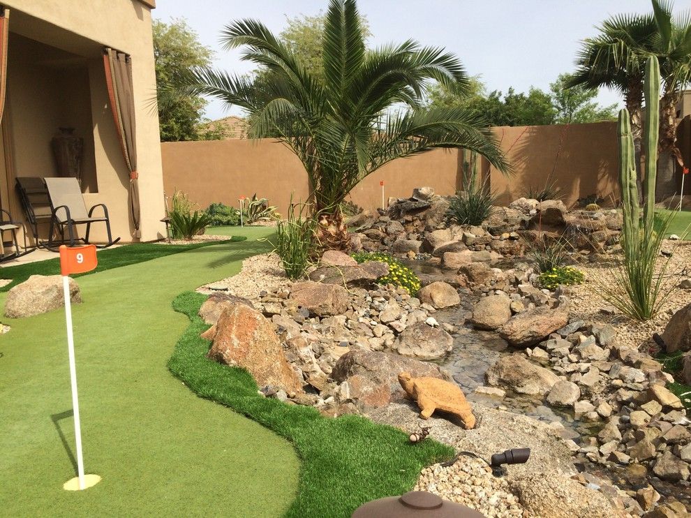 The Boulders Golf for a Contemporary Landscape with a Fire Pot and Residence #1 at Whitewing Chandler by La Modo