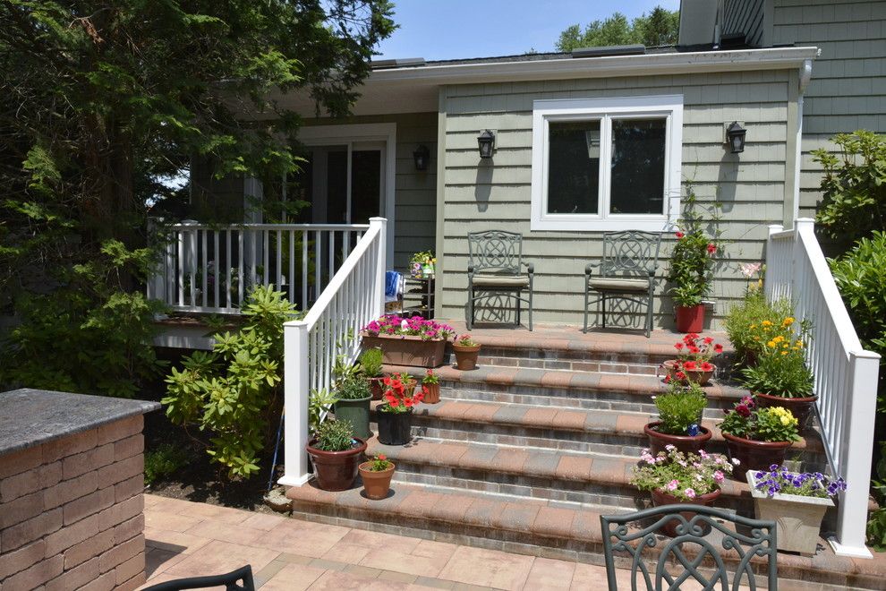 The Courts at Huntington Station for a Traditional Patio with a Outdoor Dining and Nicolock Paving Stone Patio & Firepit. Huntington,Ny by Autumn Leaf Landscape Design