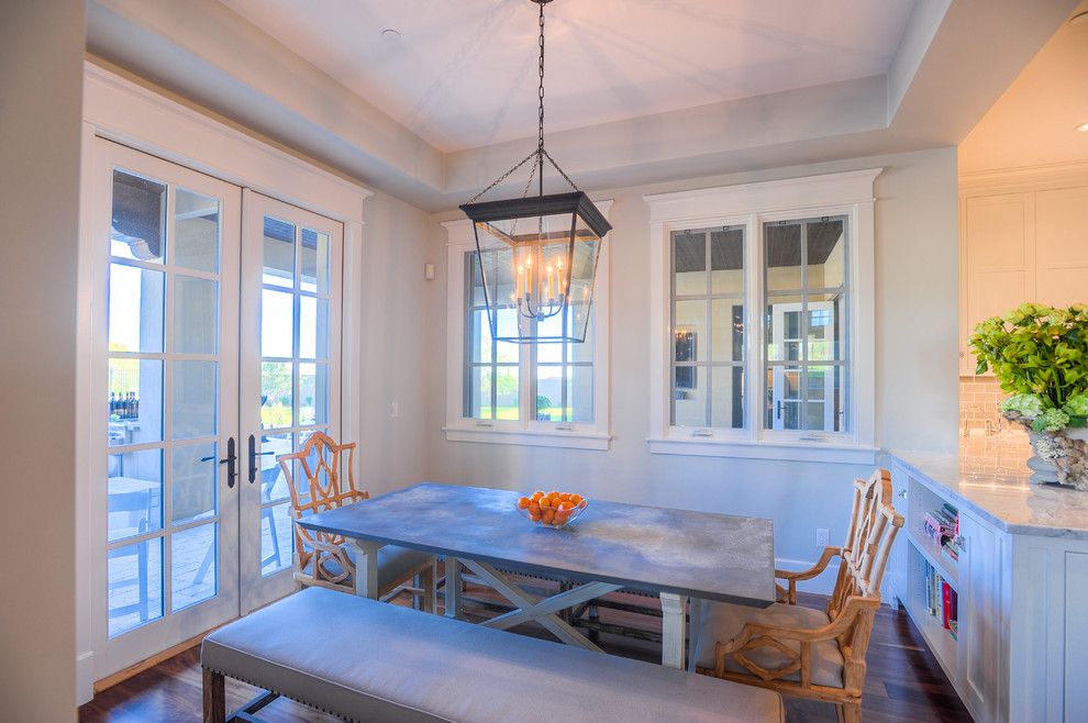 The Courts at Huntington Station for a Transitional Dining Room with a Neutral Palette and Desert Dwelling for Sports Enthusiasts | Informal Dining by Drewettworks