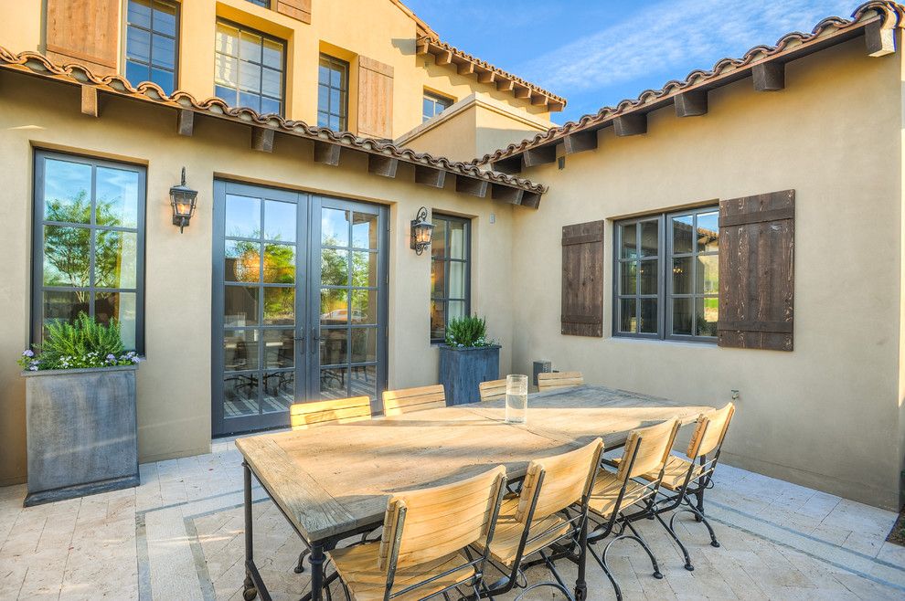 The Courts at Huntington Station for a Transitional Patio with a Wrought Iron Lighting and Desert Dwelling for Sports Enthusiasts | Outdoor Dining by Drewettworks