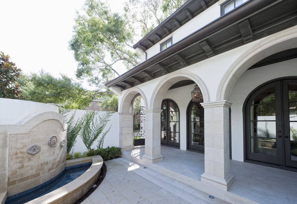 The Iron Giant Cast for a Mediterranean Porch with a Covered Walkway and Sullivan, Henry, Oggero and Associates, Inc. by Sullivan, Henry, Oggero and Associates, Inc.