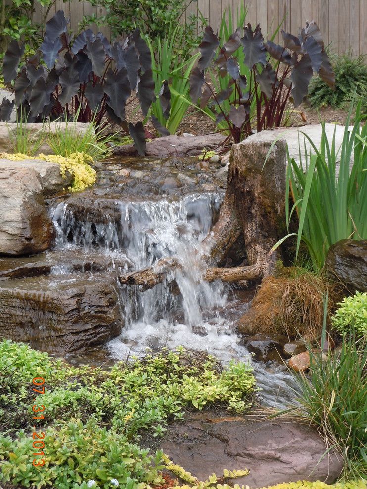 The Seasons Laurel Md for a Rustic Landscape with a Indoor Outdoor Living and Pondless Waterfalls, Disappearing Waterfalls, Baltimore, Maryland (Md) by Arbor Ridge Services