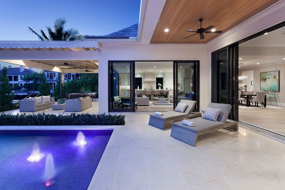 The Strand Naples Fl for a  Spaces with a Swimming Pool and Spa Deck and Jackson Custom Pools by Jackson Custom Pools