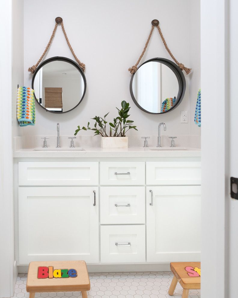 Thousand Steps Beach for a Beach Style Bathroom with a Hanging Mirror and Beach Build I by Built Custom Homes, Llc