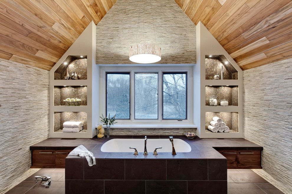 Tile and Stone Warehouse for a Contemporary Bathroom with a Brown Cabinet and Transitional Master Bath by Drury Design