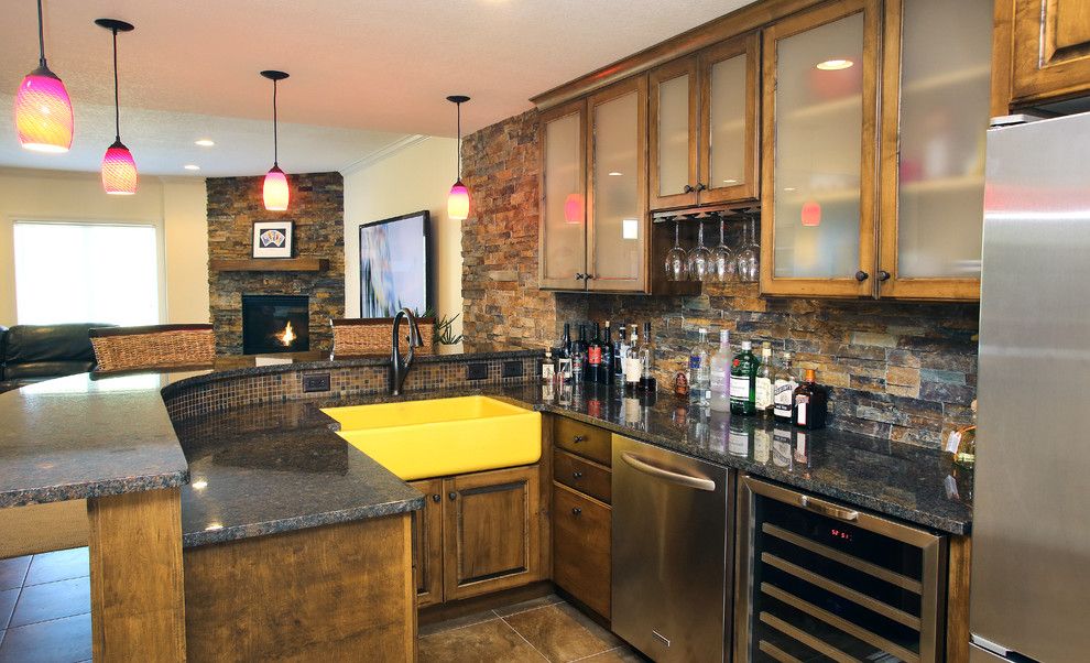 Tile and Stone Warehouse for a Transitional Home Bar with a Glass Front Cabinets and Basement Remodel Bar by Homefront Interior Design