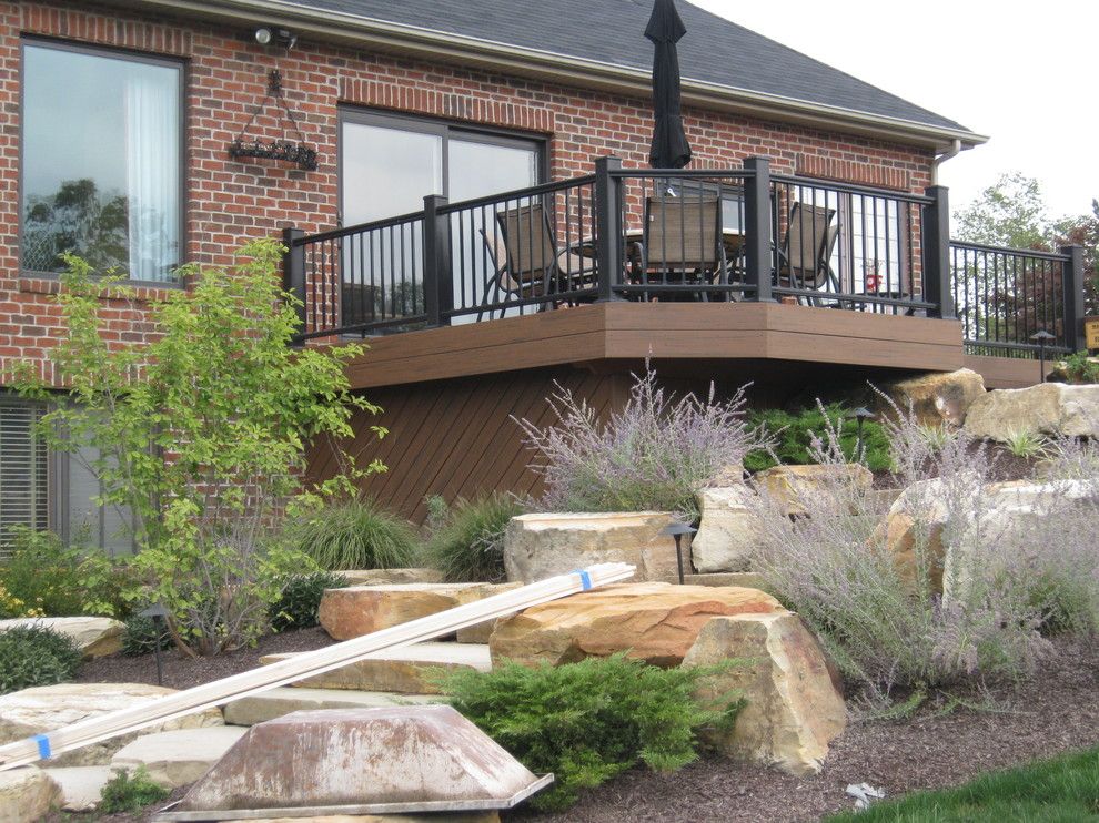 Timber Tech for a Traditional Exterior with a Azek Railing and Fort Wayne Timbertech Deck with Azek Railing by Archadeck Northeastern Indiana