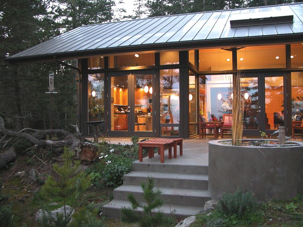 Tin Roof Rusted for a Rustic Exterior with a Terrace and Orcas12 by Jeff Luth   Soldano Luth Architects