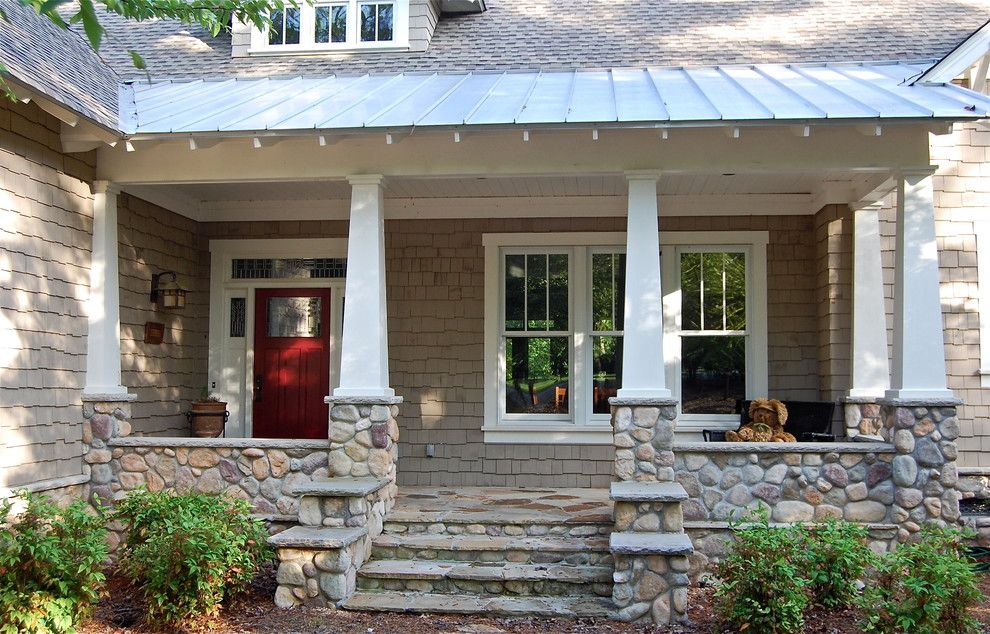 Tin Roof Rusted for a Traditional Porch with a White Door Trim and Lake Oconee Craftsman by Dreambuilt, Inc.