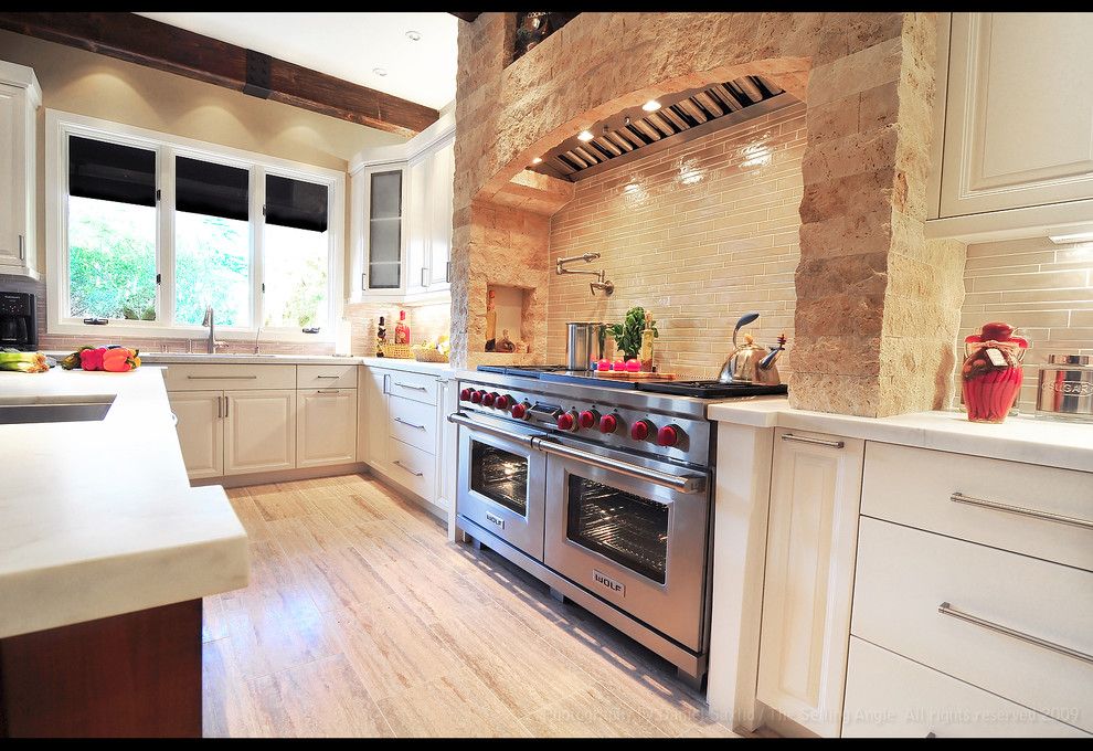 Tivoli Bowl for a Rustic Kitchen with a Tile Backsplash and Mediterranean Kitchen by Fran Kerzner  Design Synthesis