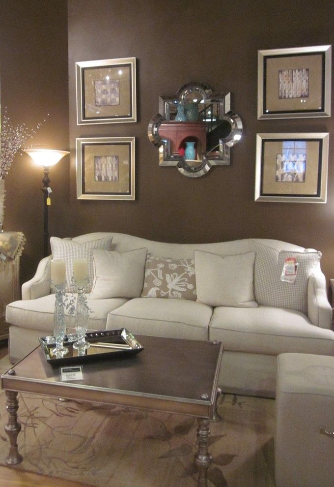 Torchere for a Eclectic Living Room with a Mirror and Photos by Classic Interiors