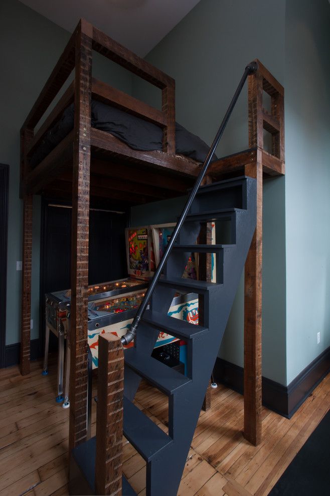 Tractor Pull Games for a Contemporary Bedroom with a Dark Wood Baseboard and Brian Mendelssohn by Jason Snyder