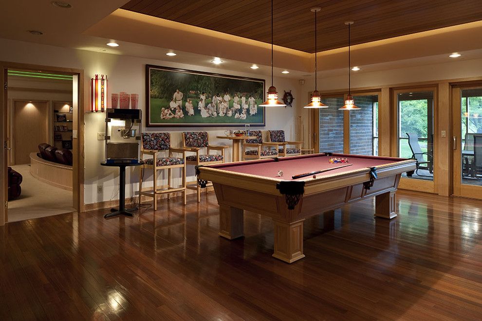 Tractor Pull Games for a Eclectic Family Room with a Pool Table and Private Residence by Don F. Wong