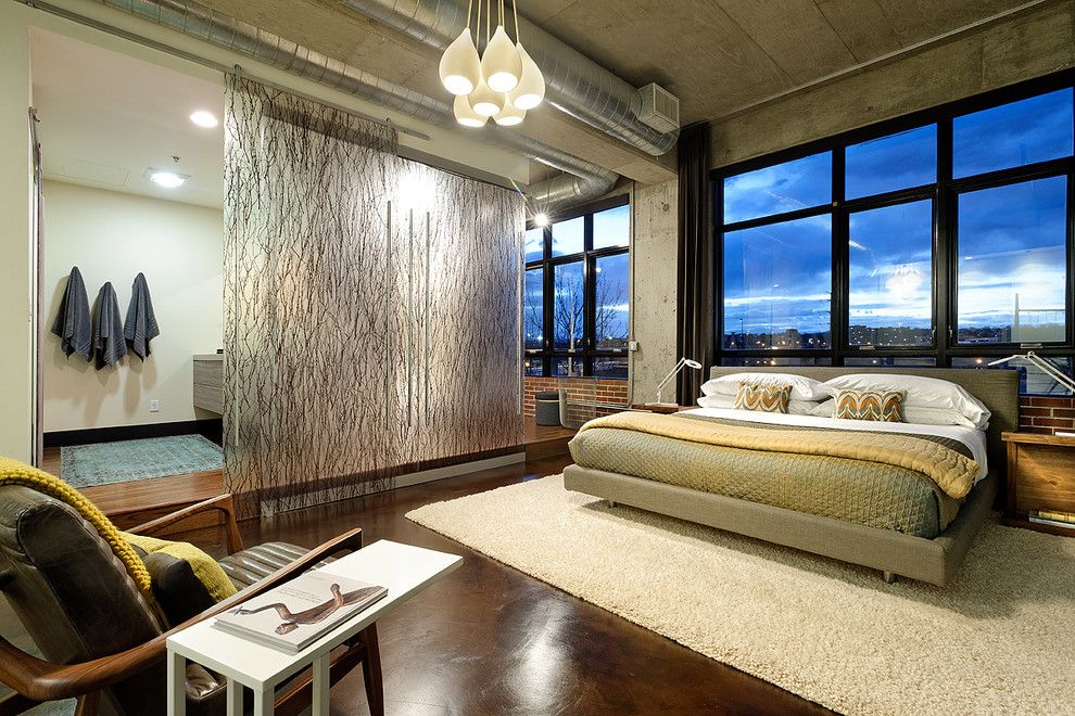 Translucent Concrete for a Contemporary Bedroom with a Black Window Trim and Denver Loft Remodel by Weber Interior Design