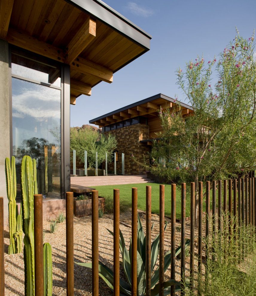 Translucent Concrete for a Contemporary Landscape with a Flat Roof and Camelback by Stonecreek Building Company, Inc.