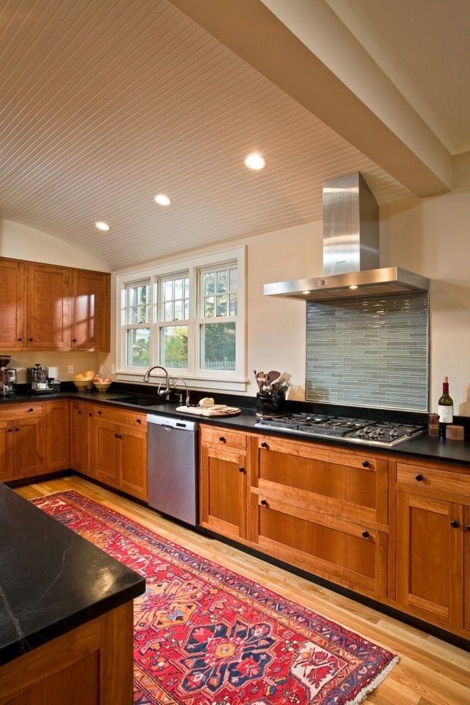 Treehouse Builders for a Eclectic Kitchen with a Stainless Hood and Charming Revival by Teakwood Builders, Inc.