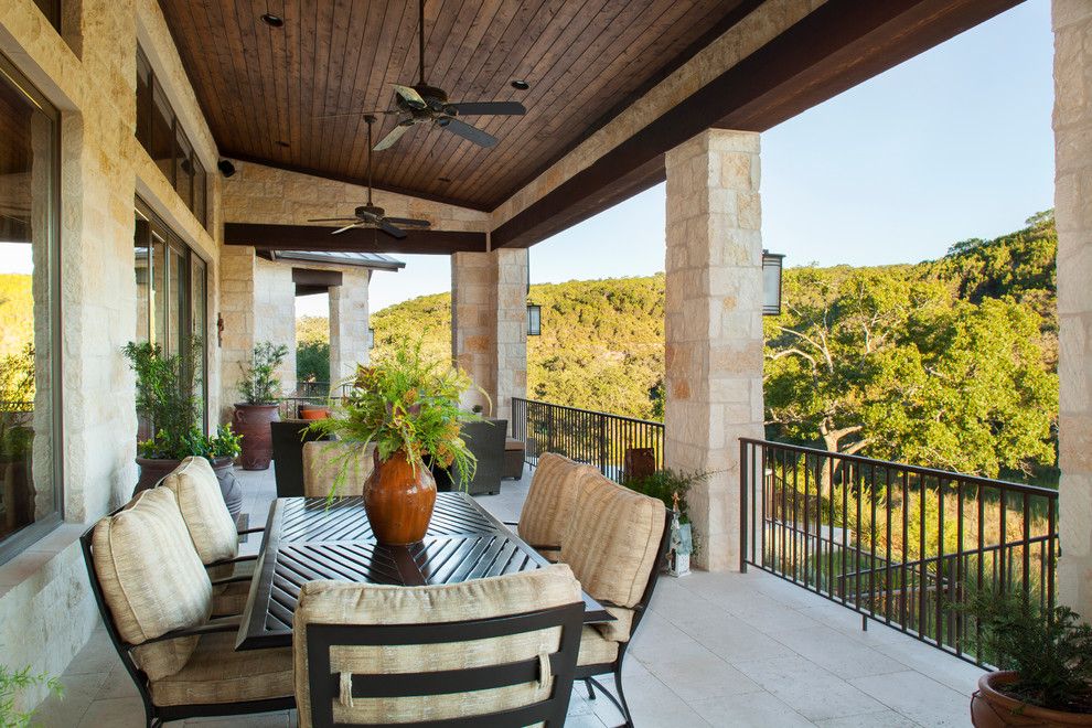 Trex Select for a Rustic Deck with a Metal Railing and Hill Country Custom Home by Dawn Hearn Interior Design