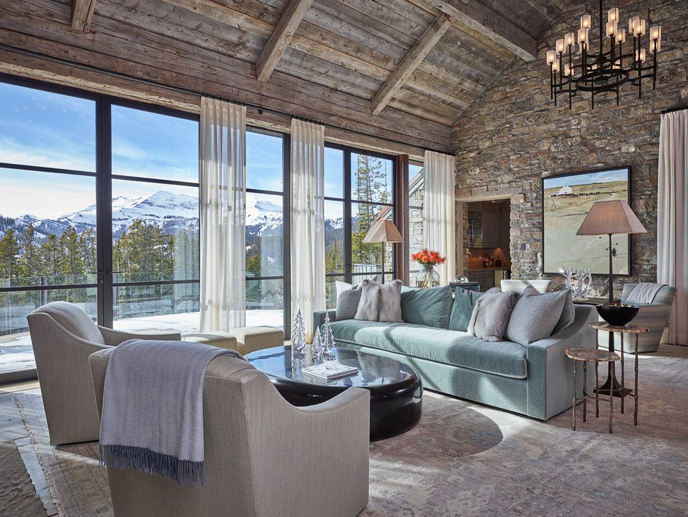 Trimountain for a Rustic Living Room with a Blue Sofa and Lone Mountain Hideaway by Wrj Design