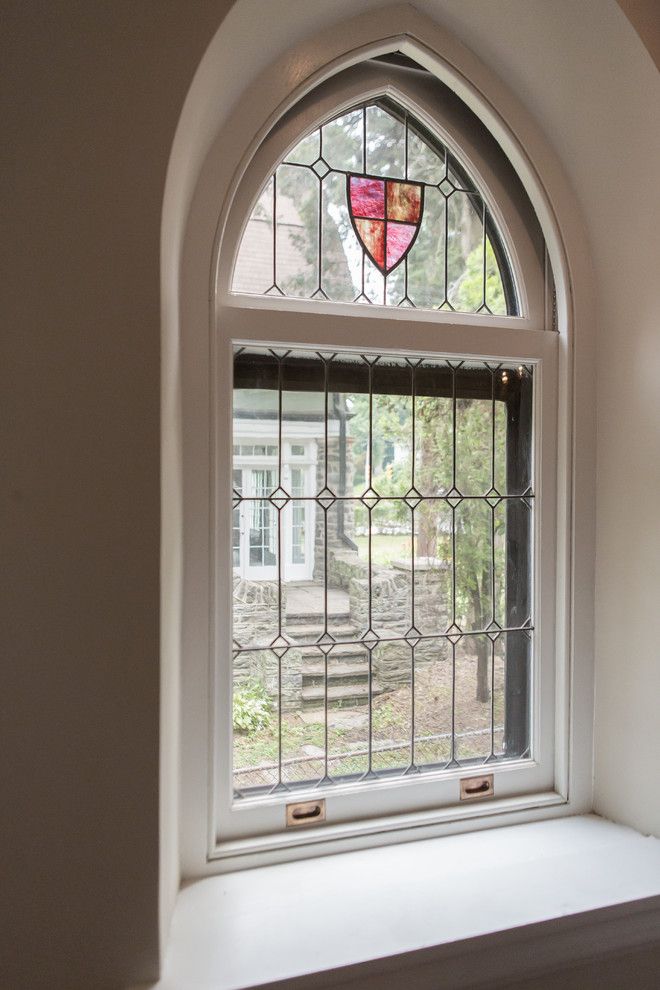 Tudor Oaks for a Traditional Entry with a Stained Glass and Complete Restoration of a 110 Year Old Tudor Style Home by Red Oak Builders, Llc