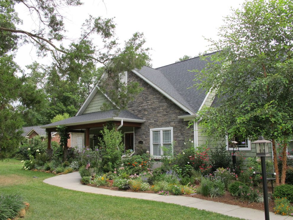 Turf Masters for a Craftsman Exterior with a Rock Wall and Front Porch Makeover Summer 2010 by Anna Looper