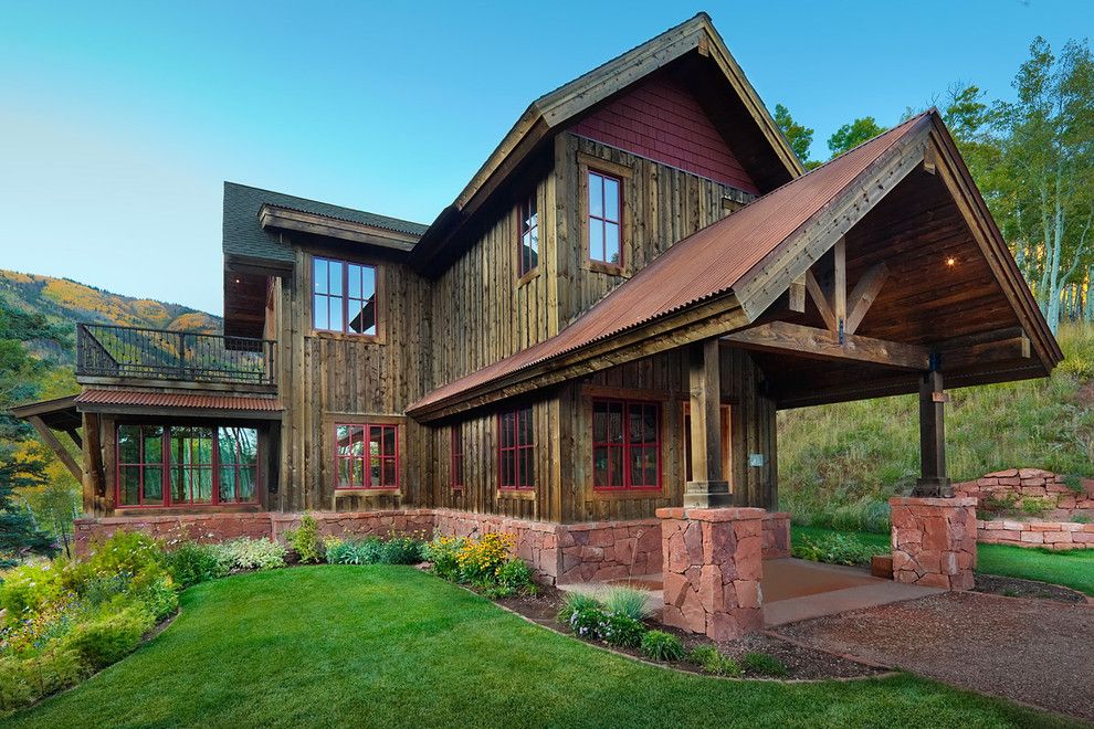 Turf Masters for a Rustic Exterior with a Cabin and Reudi Retreat by Axis Productions