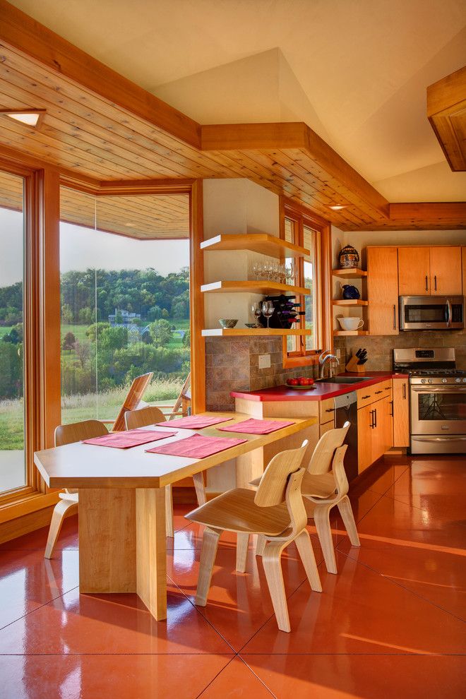 Twinspires for a Midcentury Dining Room with a Bay Window and Galena Usonian by Genesis Architecture, Llc.