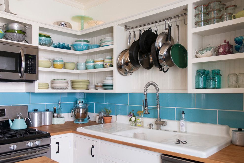 Unclog Kitchen Sink for a Eclectic Kitchen with a Hanging Pot Rack and Chelsea + Kiel: Columbus, Ohio by Adrienne Derosa