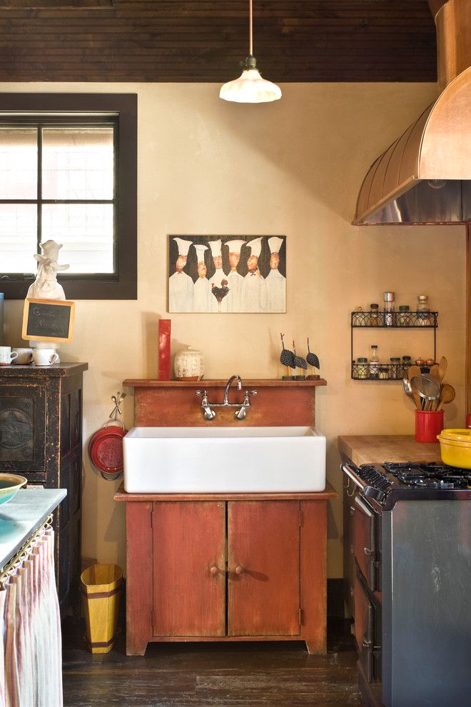 Unclog Kitchen Sink for a Rustic Kitchen with a Farmhouse Sink and Rocky Mountain Retreat by Bob Greenspan Photography