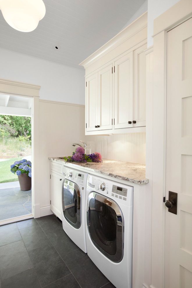 Unclogging a Sink for a Traditional Laundry Room with a Sloped Ceiling and Waterfront Estate by Jodi Foster Design + Planning