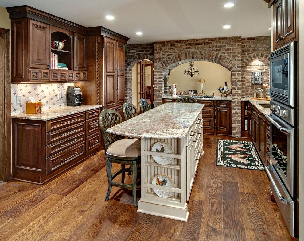 Uncommon Goods.com for a Rustic Kitchen with a Wide Plank Oak Floors and Scotia Remodel by Knight Construction Design Inc.